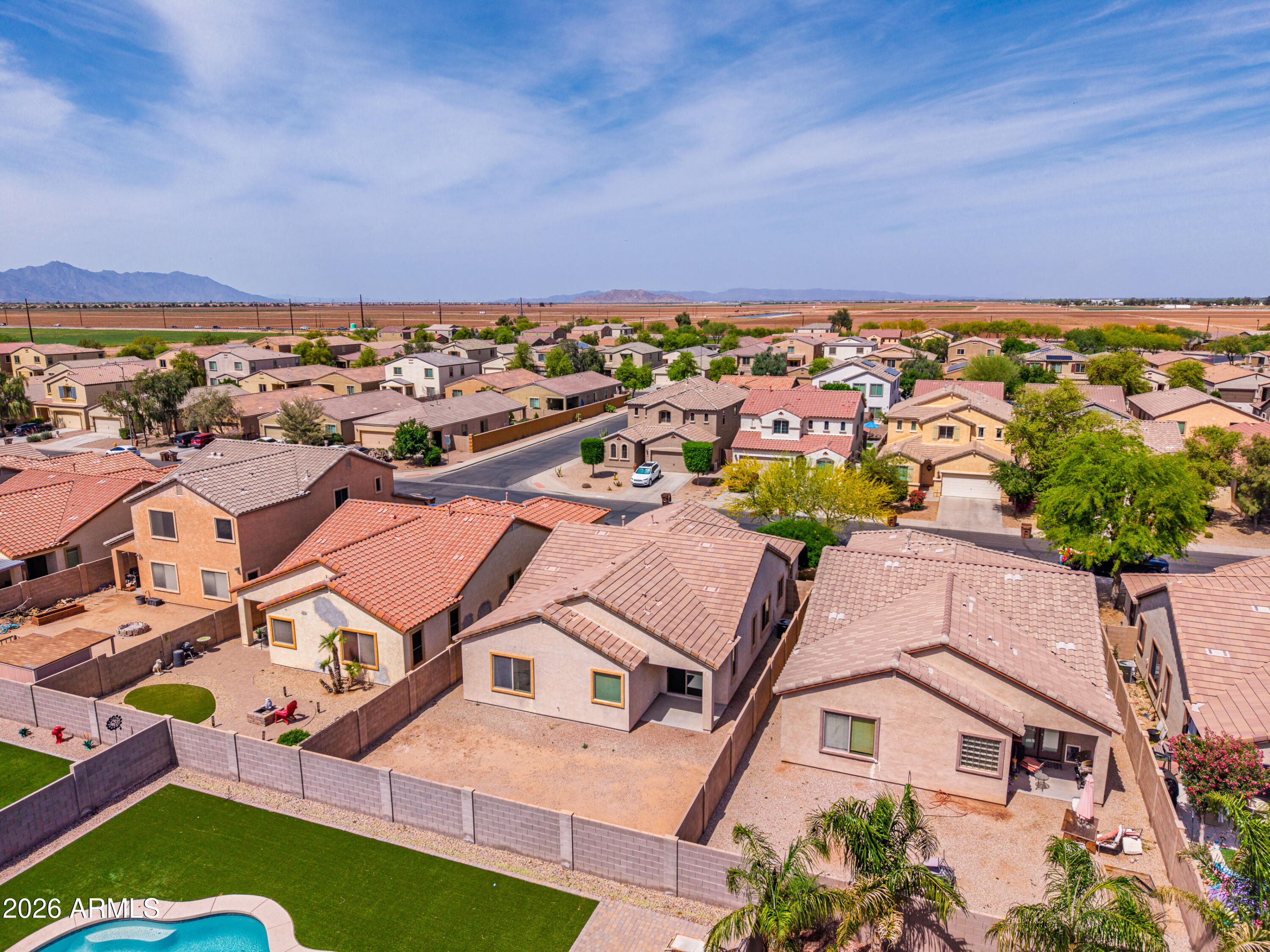 38061 West Merced Street Maricopa, AZ 85138 - Photo 43 of 49 an aerial view of residential houses with outdoor space and ocean view
