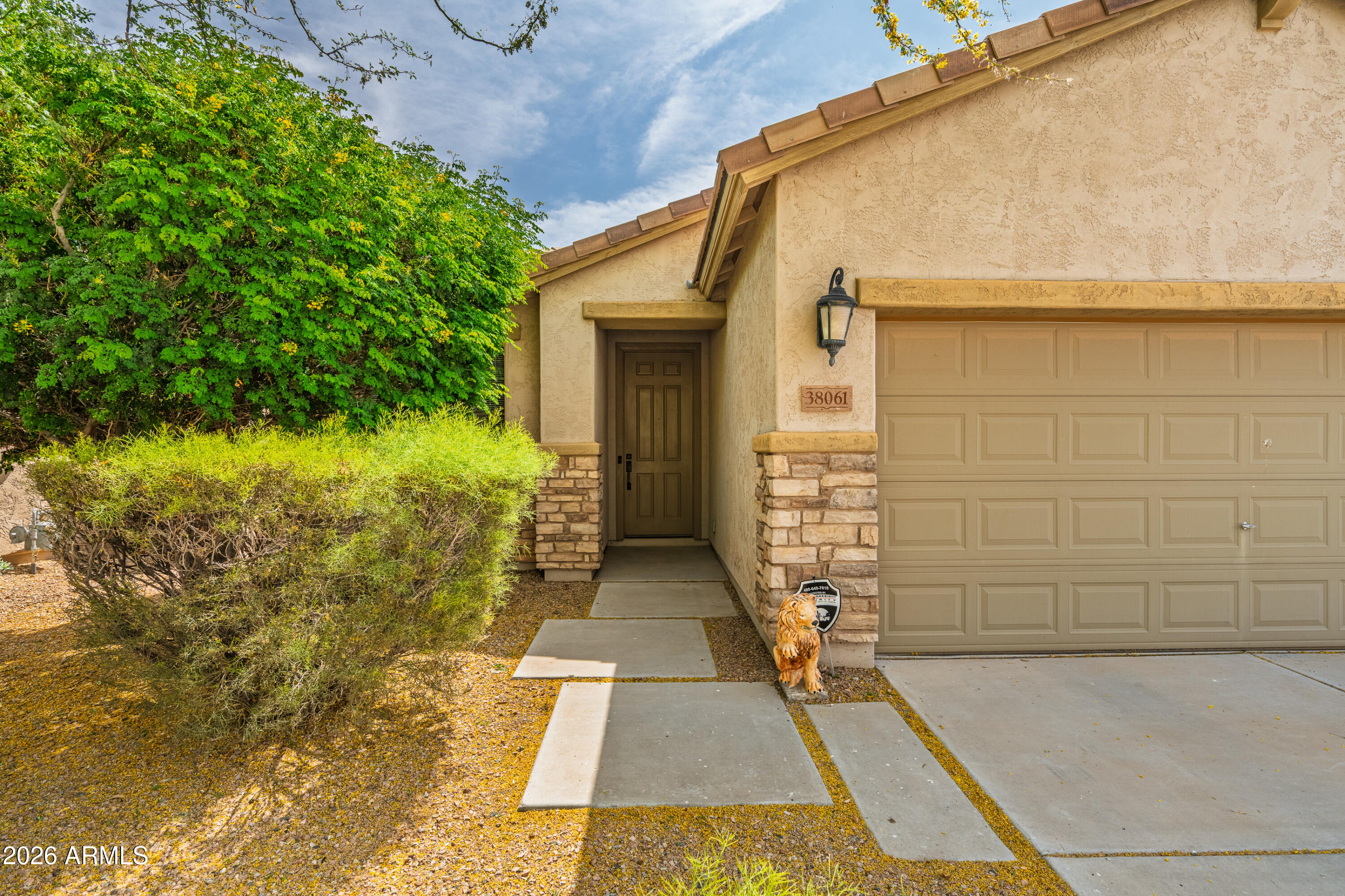 38061 West Merced Street Maricopa, AZ 85138 - Photo 7 of 49 a path view of a house