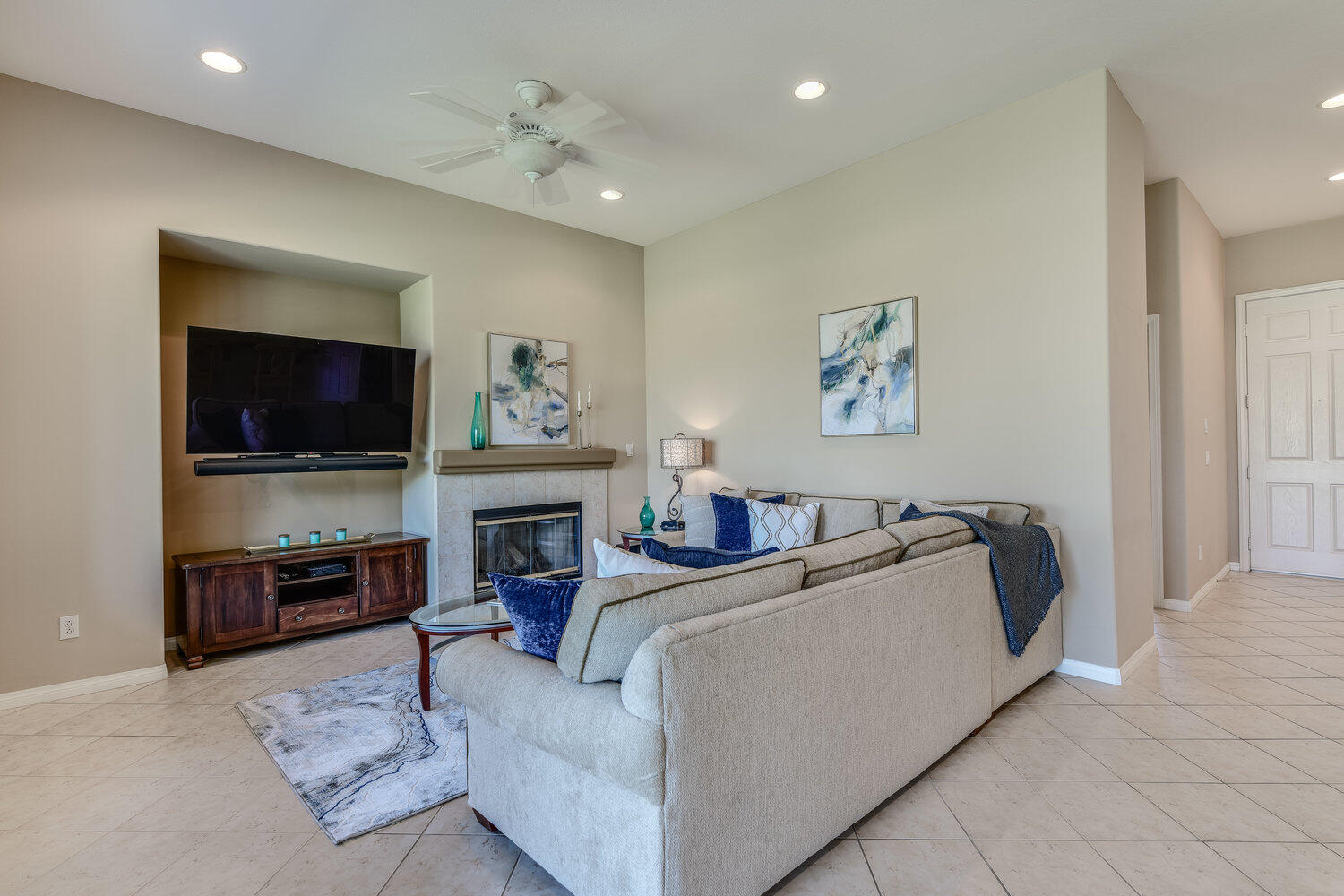 80538 Knightswood Road Indio, CA 92201 - Photo 8 of 32 a living room with furniture and a flat screen tv