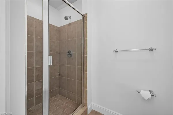 a bathroom with a sink a toilet and bathtub