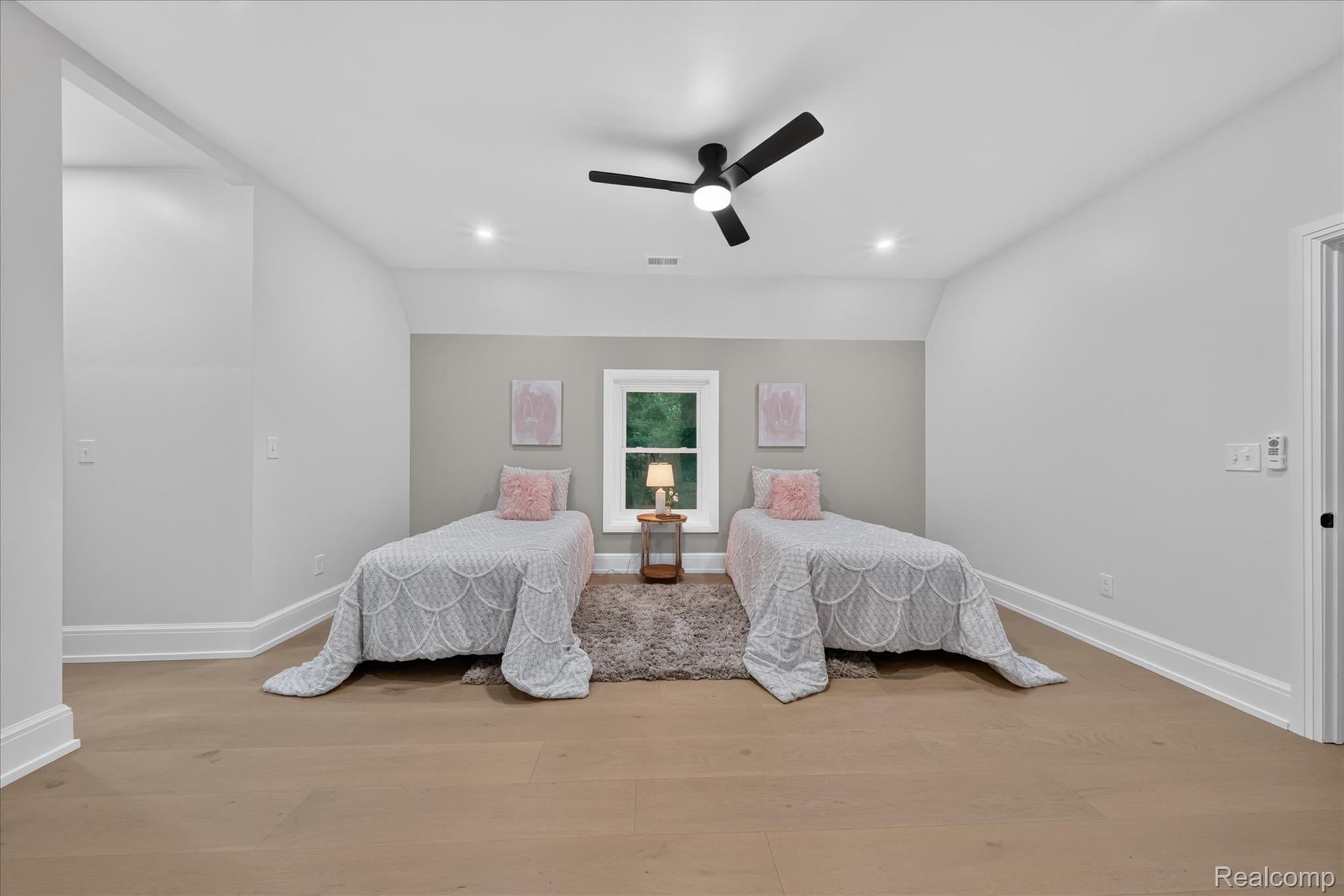 3250 Sherbourne Road Detroit, MI 48221 - Photo 28 of 36 Recessed lighting, wood-finish flooring, ceiling fan, natural light from a window, and a neutral color palette
