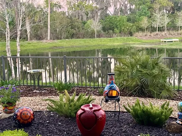 a view of a garden with sitting area and entertaining space