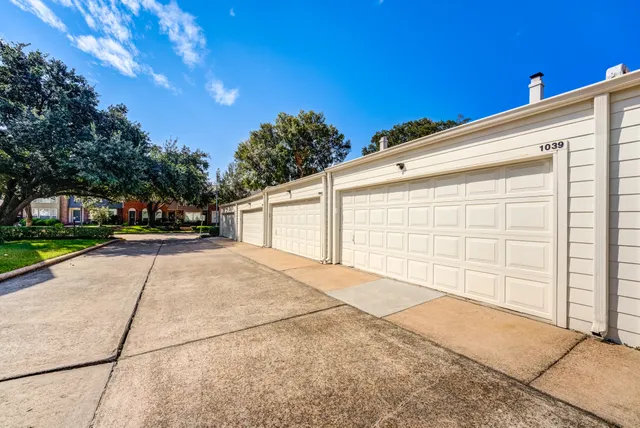 a view of a backyard of the house