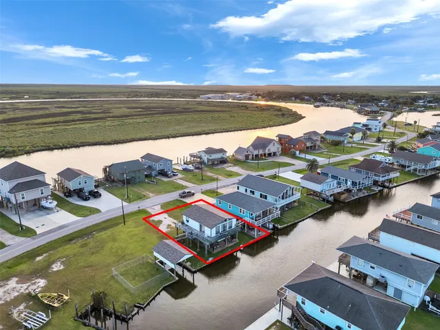 a view of a dining room with furniture and window