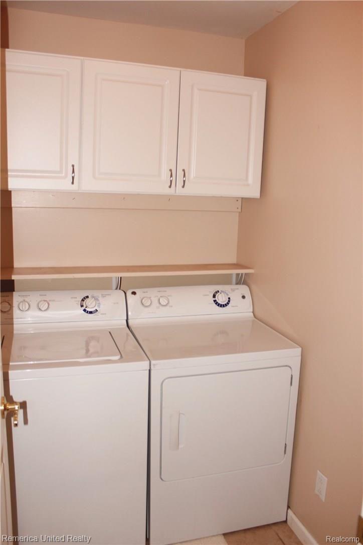 2435 Gibson Road Grand Blanc, MI 48439 - Photo 19 of 25 1st floor laundry with additional storage