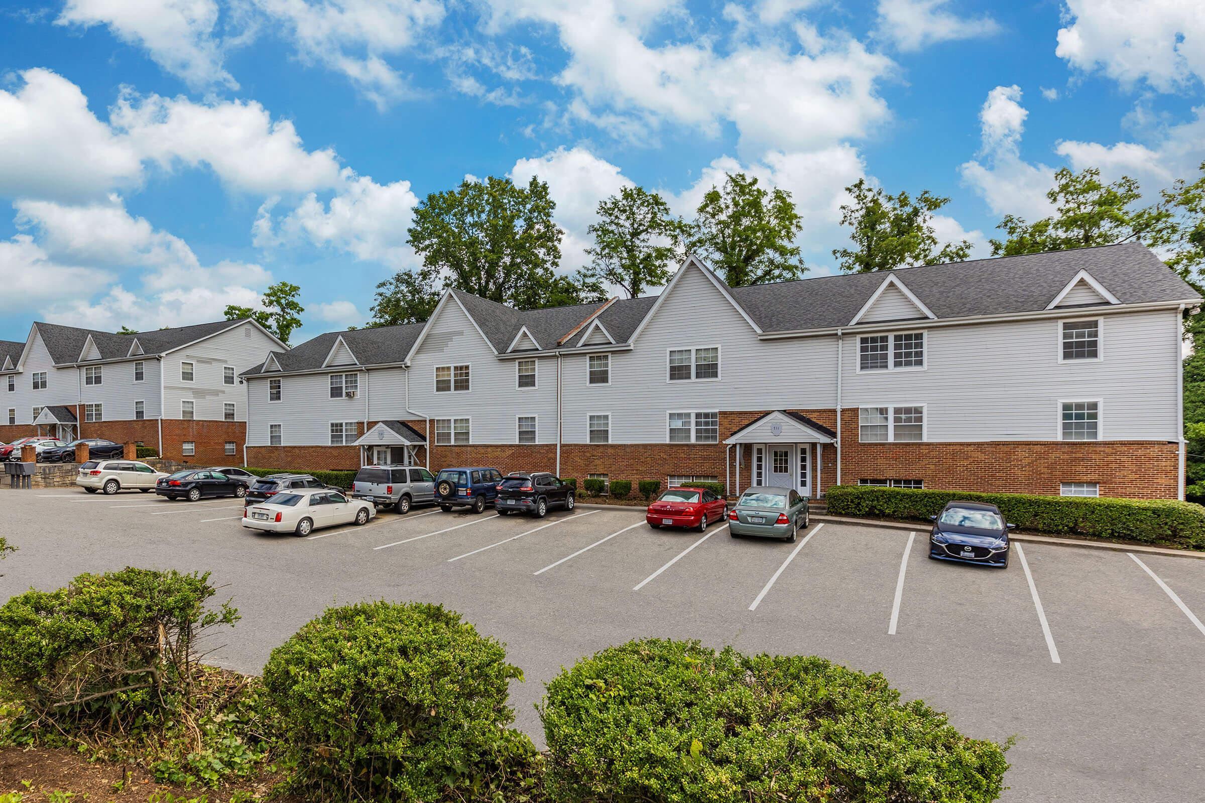 737 Townside Road Southwest, Unit 38 Roanoke, VA 24014 - Photo 4 of 19 an aerial view of a house with a garden and parking area