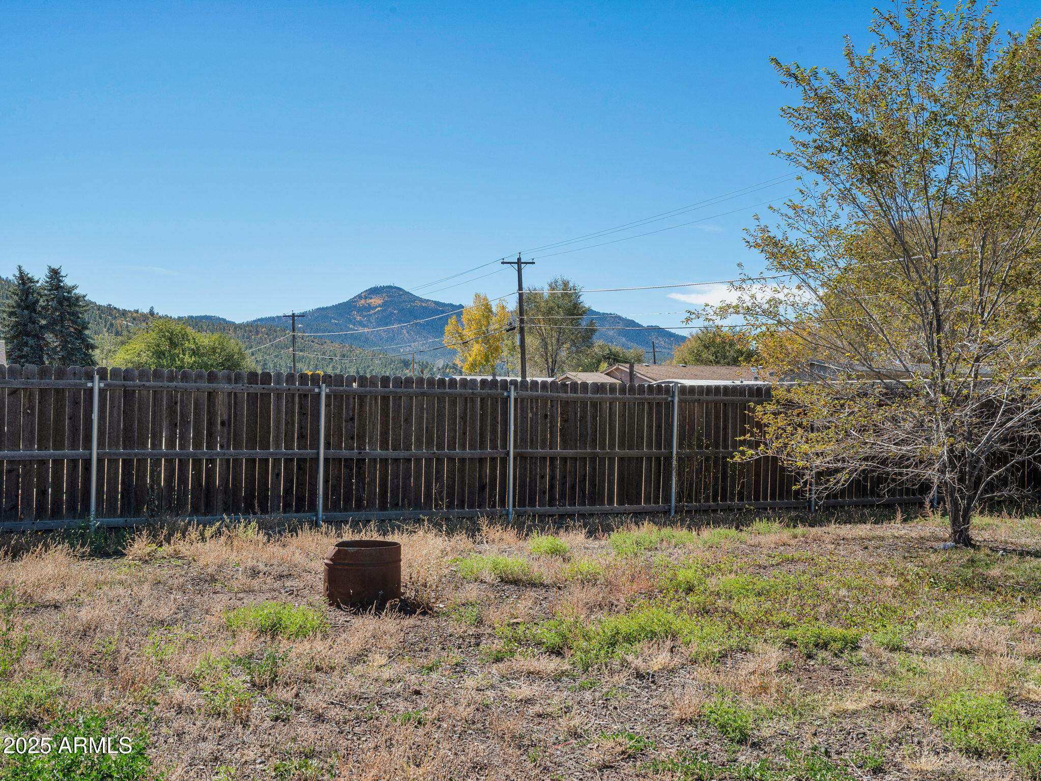 907 Quarter Horse Road Williams, AZ 86046 - Photo 26 of 26 a view of a chair and iron fence
