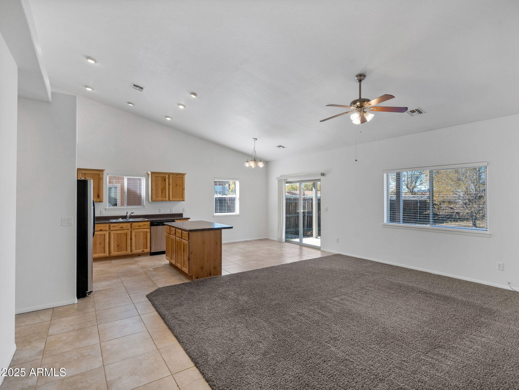 907 Quarter Horse Road Williams, AZ 86046 - Photo 4 of 26 a view of a kitchen with furniture and a window