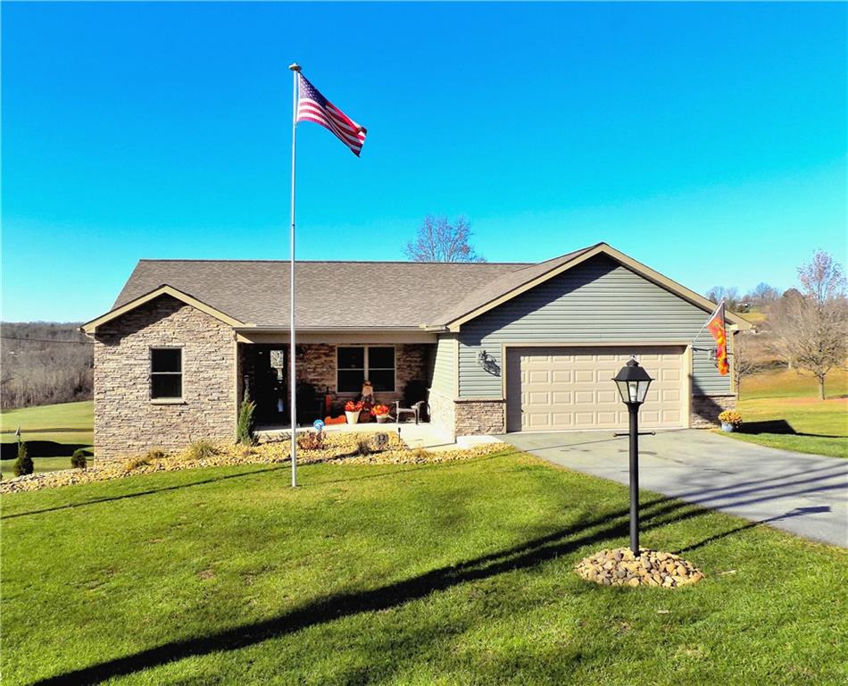 175 Springer Road McClellandtown, PA 15458 - Photo 1 of 18 a house view with a outdoor space