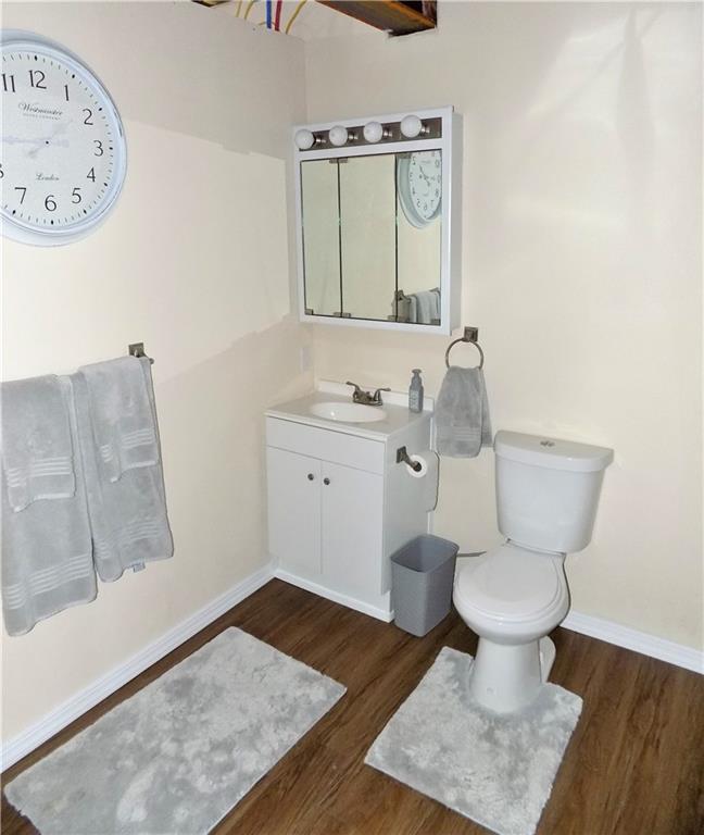 175 Springer Road McClellandtown, PA 15458 - Photo 16 of 18 a bathroom with a toilet a sink and mirror