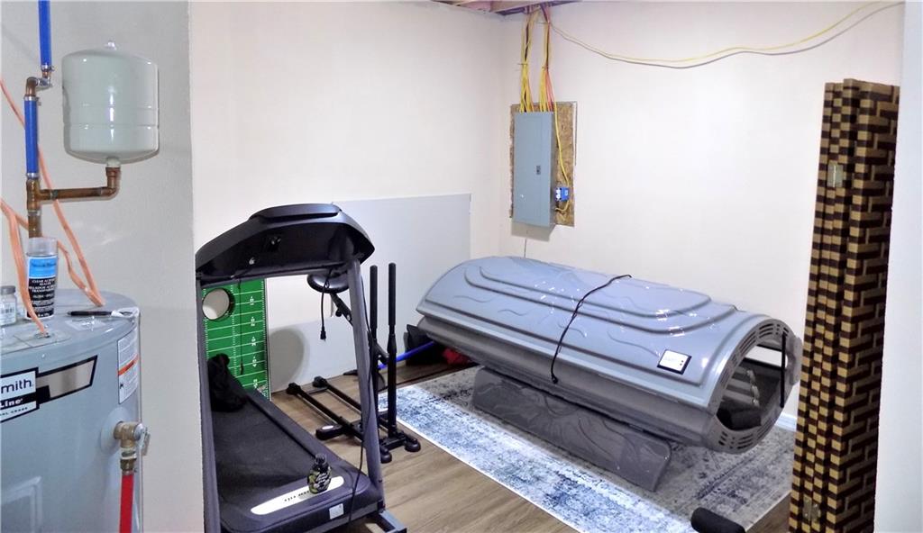 175 Springer Road McClellandtown, PA 15458 - Photo 18 of 18 a view of a room with gym equipment