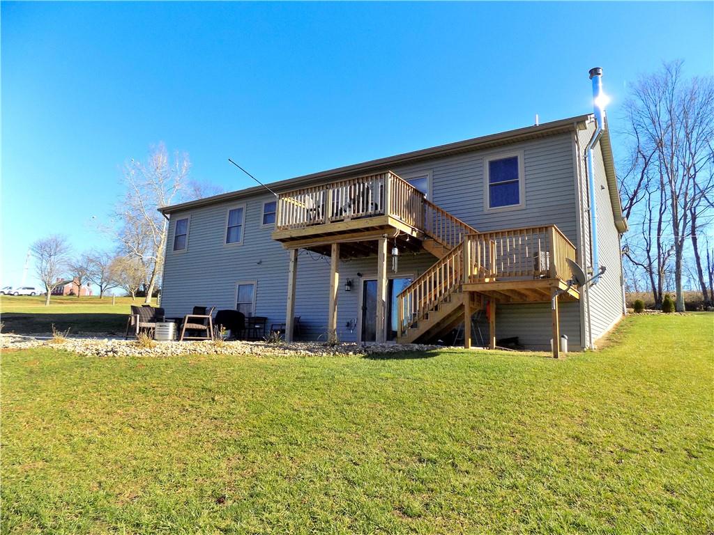 175 Springer Road McClellandtown, PA 15458 - Photo 2 of 18 a view of a house with yard and porch