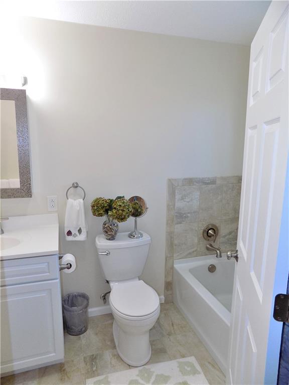 175 Springer Road McClellandtown, PA 15458 - Photo 8 of 18 a bathroom with a toilet and a bathtub