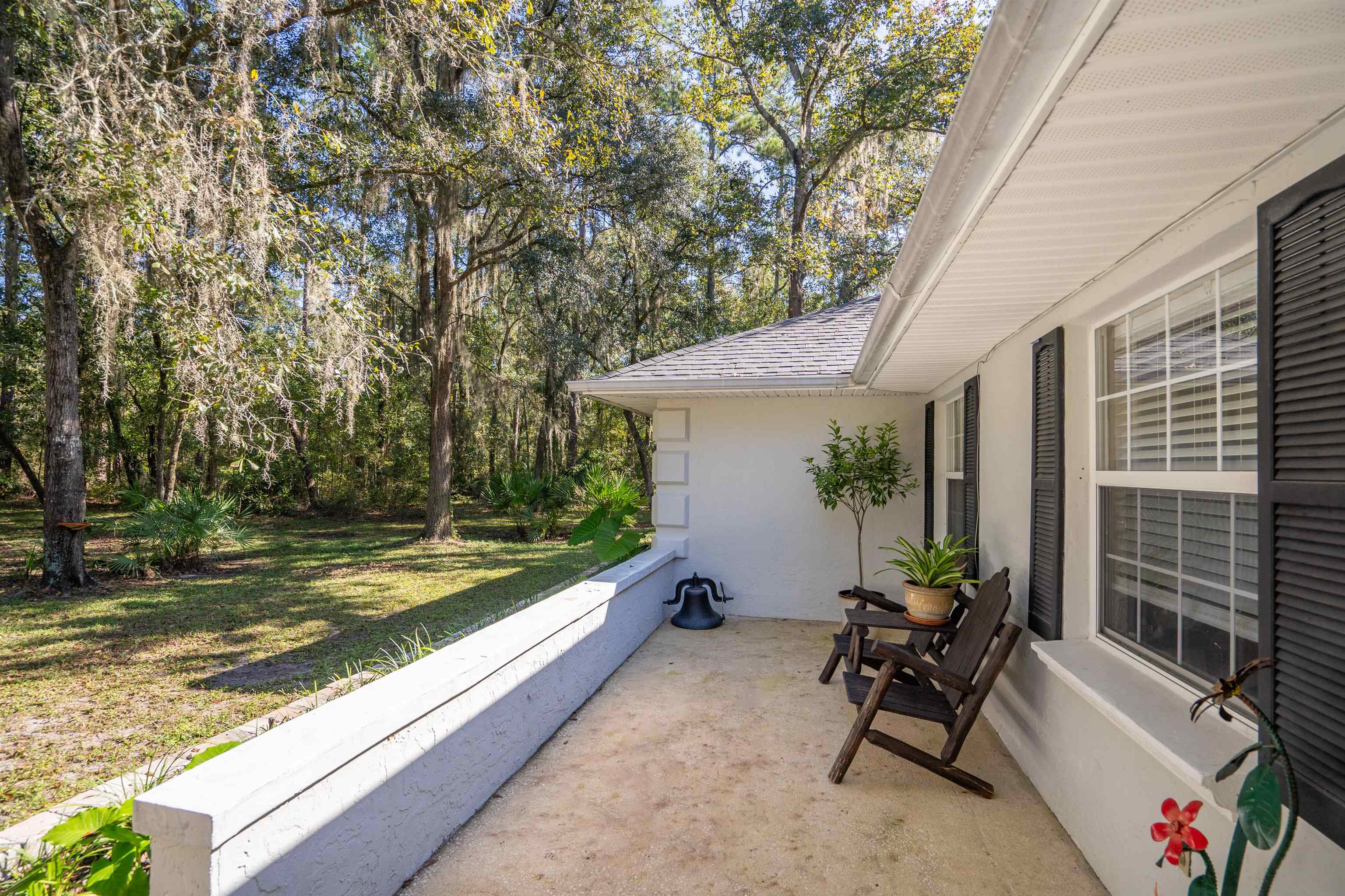 5525 St Ambrose Church Road Elkton, FL 32033 - Photo 4 of 66 a view of a house with backyard and sitting area