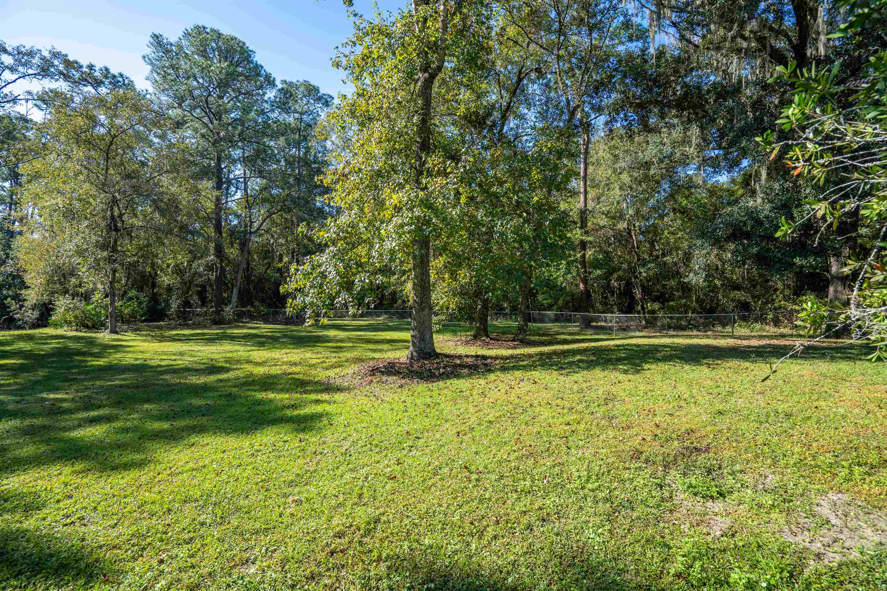 5525 St Ambrose Church Road Elkton, FL 32033 - Photo 45 of 66 a view of a fountain in front of a house
