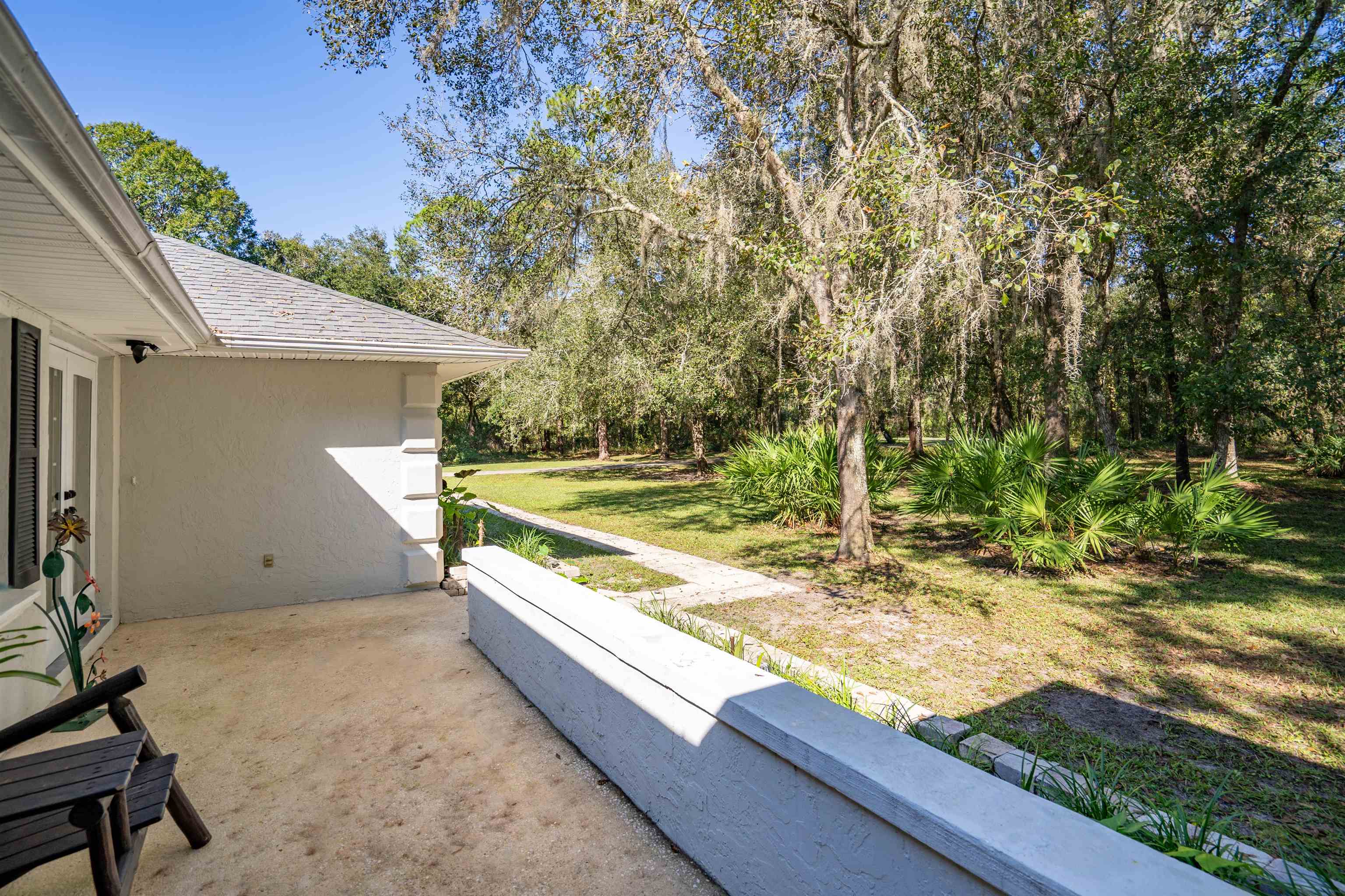 5525 St Ambrose Church Road Elkton, FL 32033 - Photo 49 of 66 a view of a backyard with tub