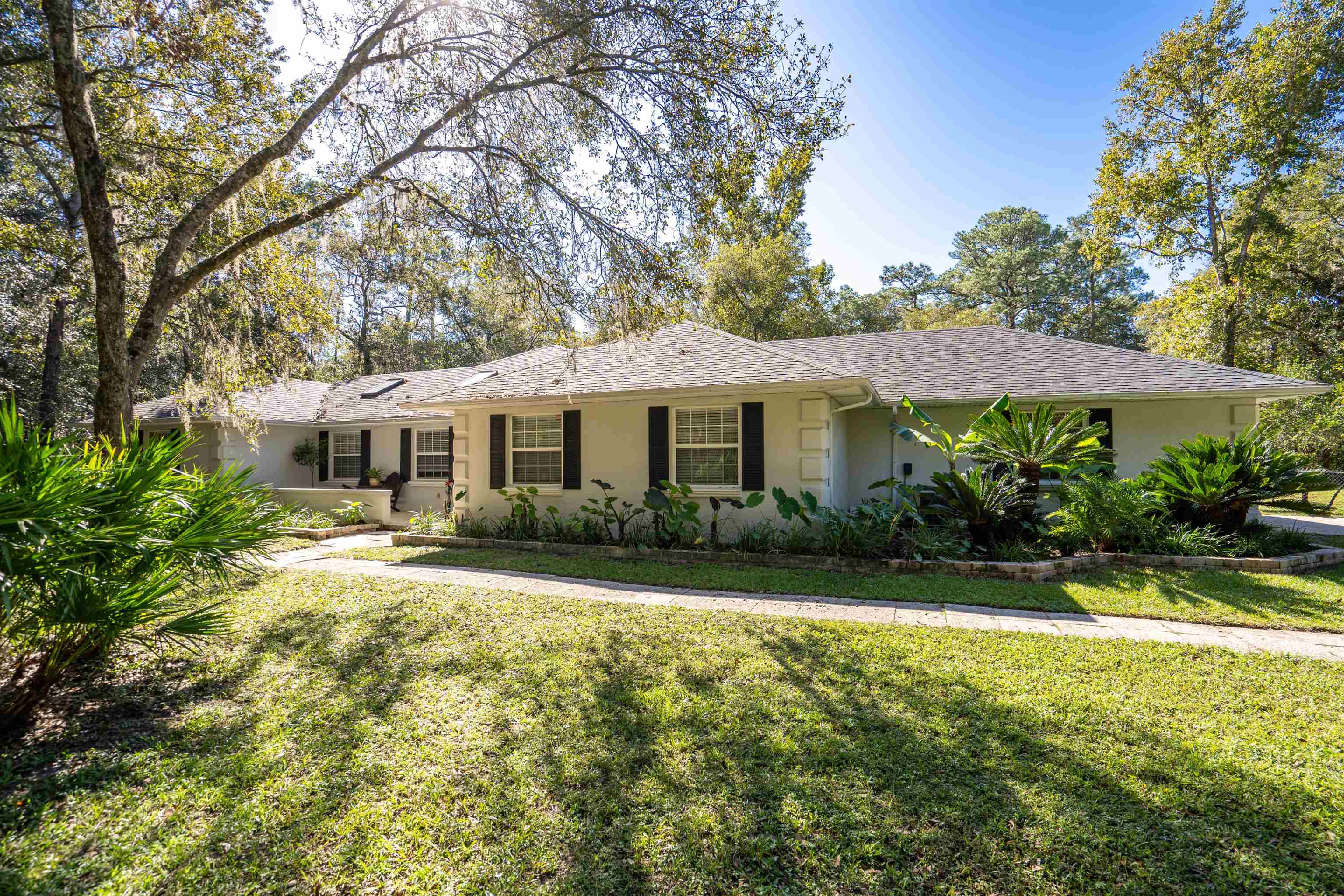 5525 St Ambrose Church Road Elkton, FL 32033 - Photo 50 of 66 a front view of a house with a yard