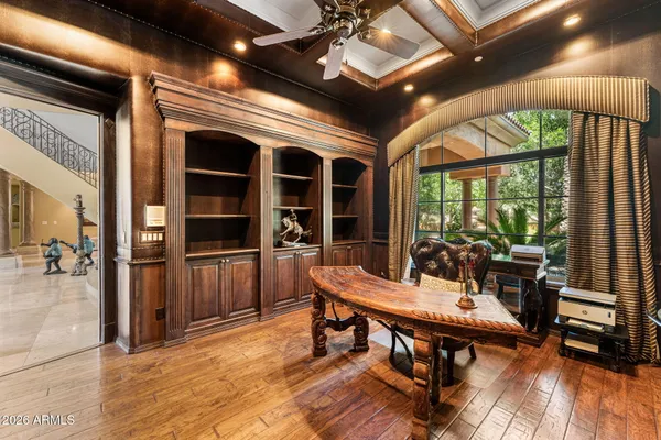 a bathroom with a granite countertop sink a vanity and a mirror