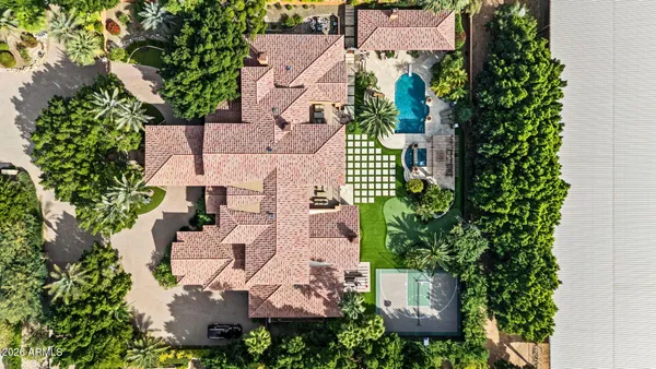 an aerial view of residential building with parking space