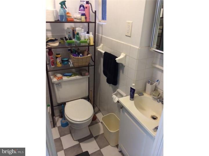 330 South Hicks Street Philadelphia, PA 19102 - Photo 12 of 21 a bathroom with a toilet and a sink