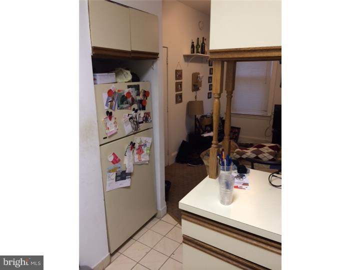 330 South Hicks Street Philadelphia, PA 19102 - Photo 10 of 21 a bathroom with a sink and a mirror