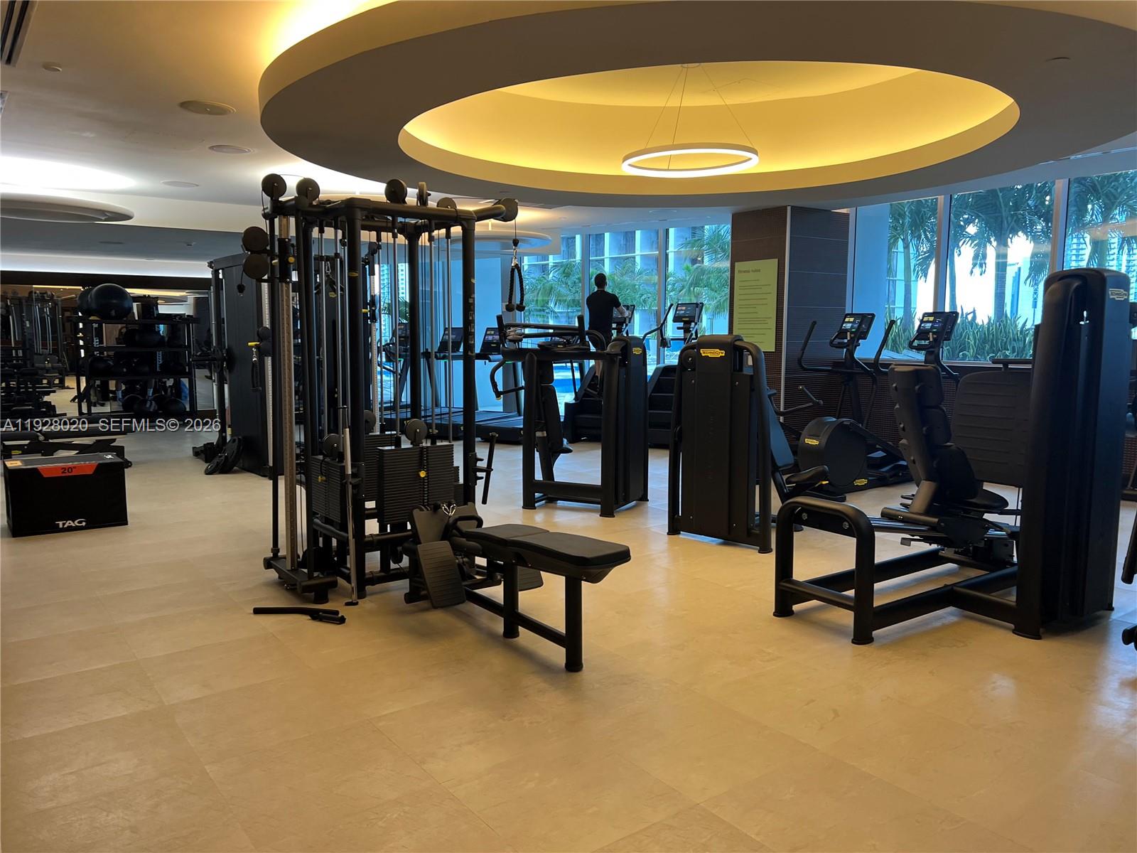 200 Biscayne Blvd Way, Unit 3106 Miami, FL 33131 - Photo 21 of 27 a view of a room with gym equipment