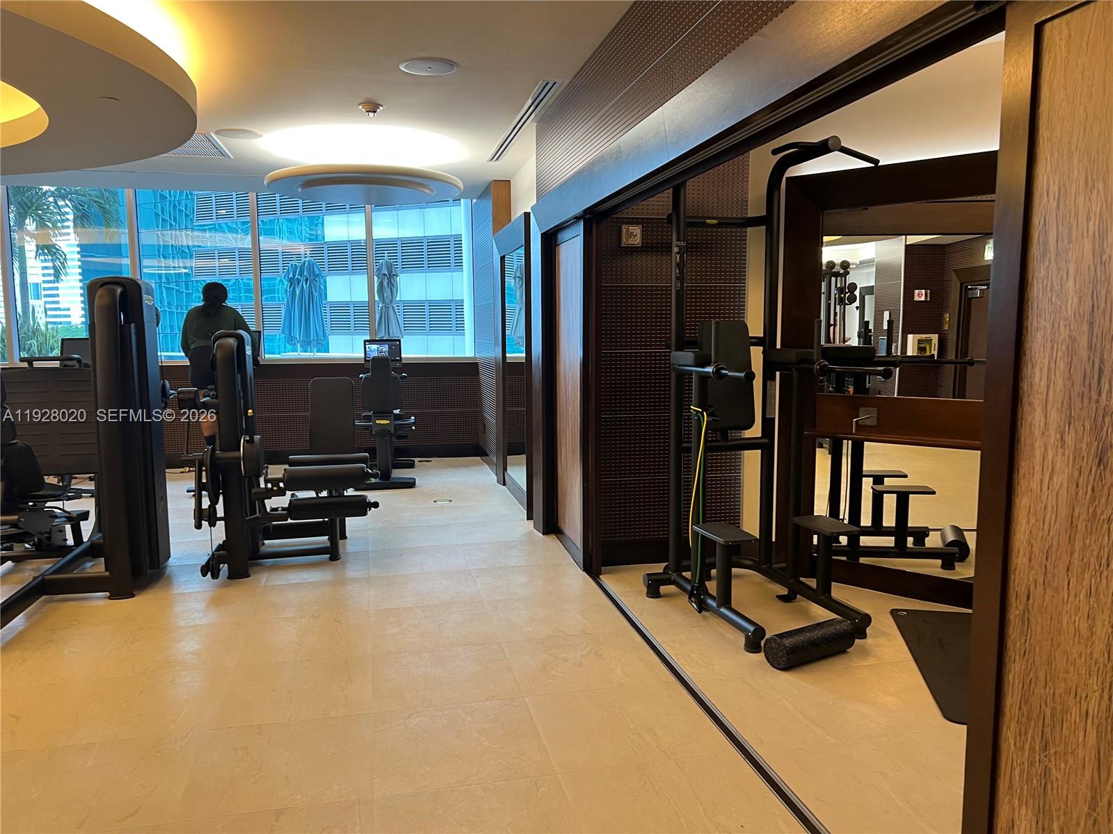 200 Biscayne Blvd Way, Unit 3106 Miami, FL 33131 - Photo 23 of 27 a view of a room with gym equipment