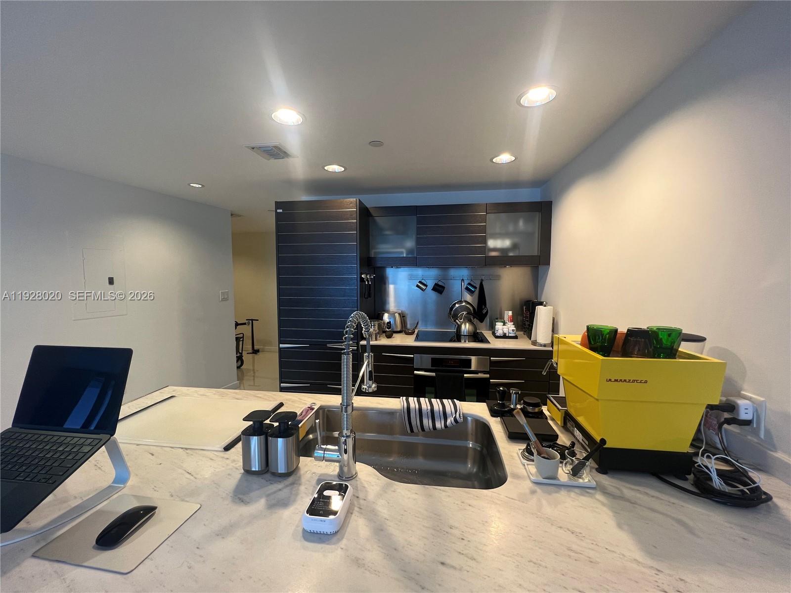 200 Biscayne Blvd Way, Unit 3106 Miami, FL 33131 - Photo 9 of 27 a living room with furniture