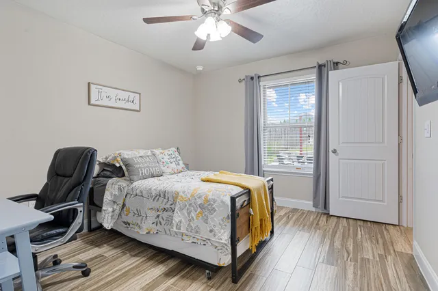 a bedroom with furniture and a couch