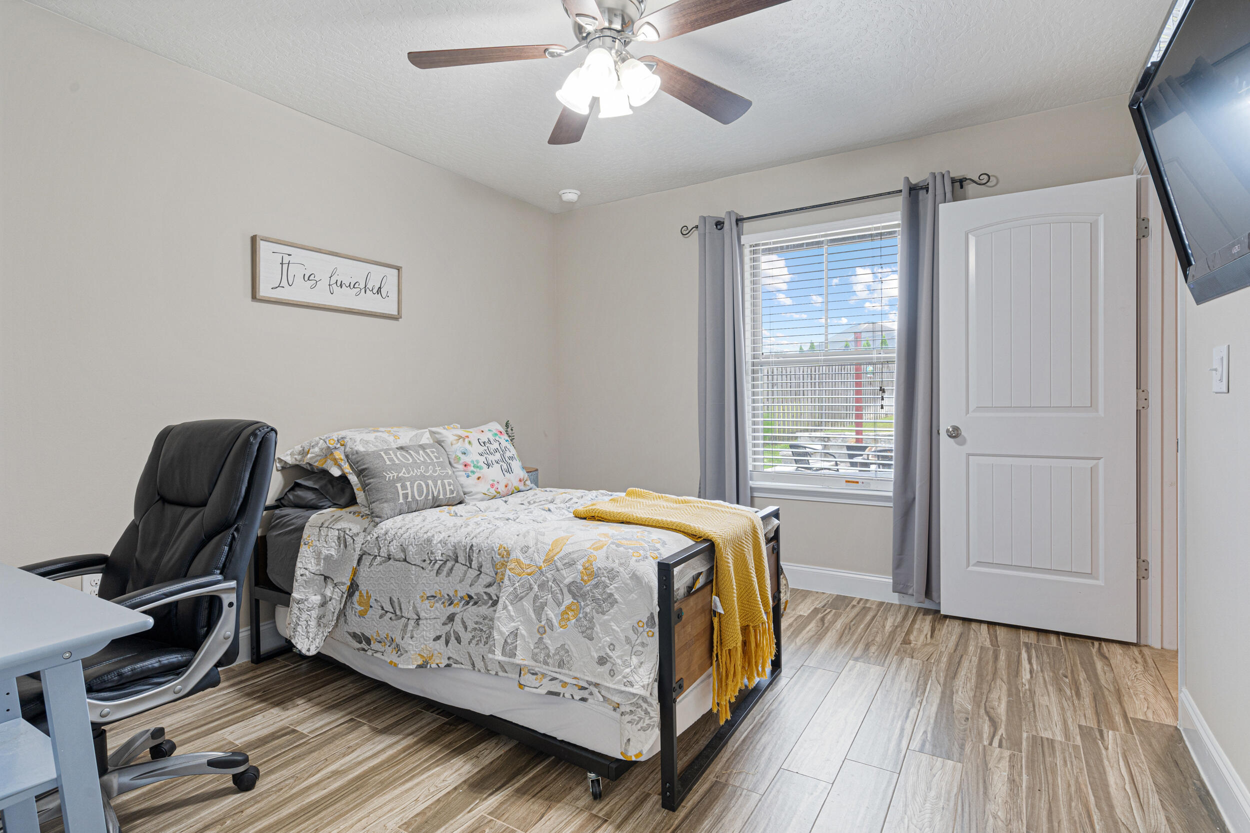 4646 Chanan Drive Crestview, FL 32539 - Photo 29 of 56 a bedroom with a bed and a window