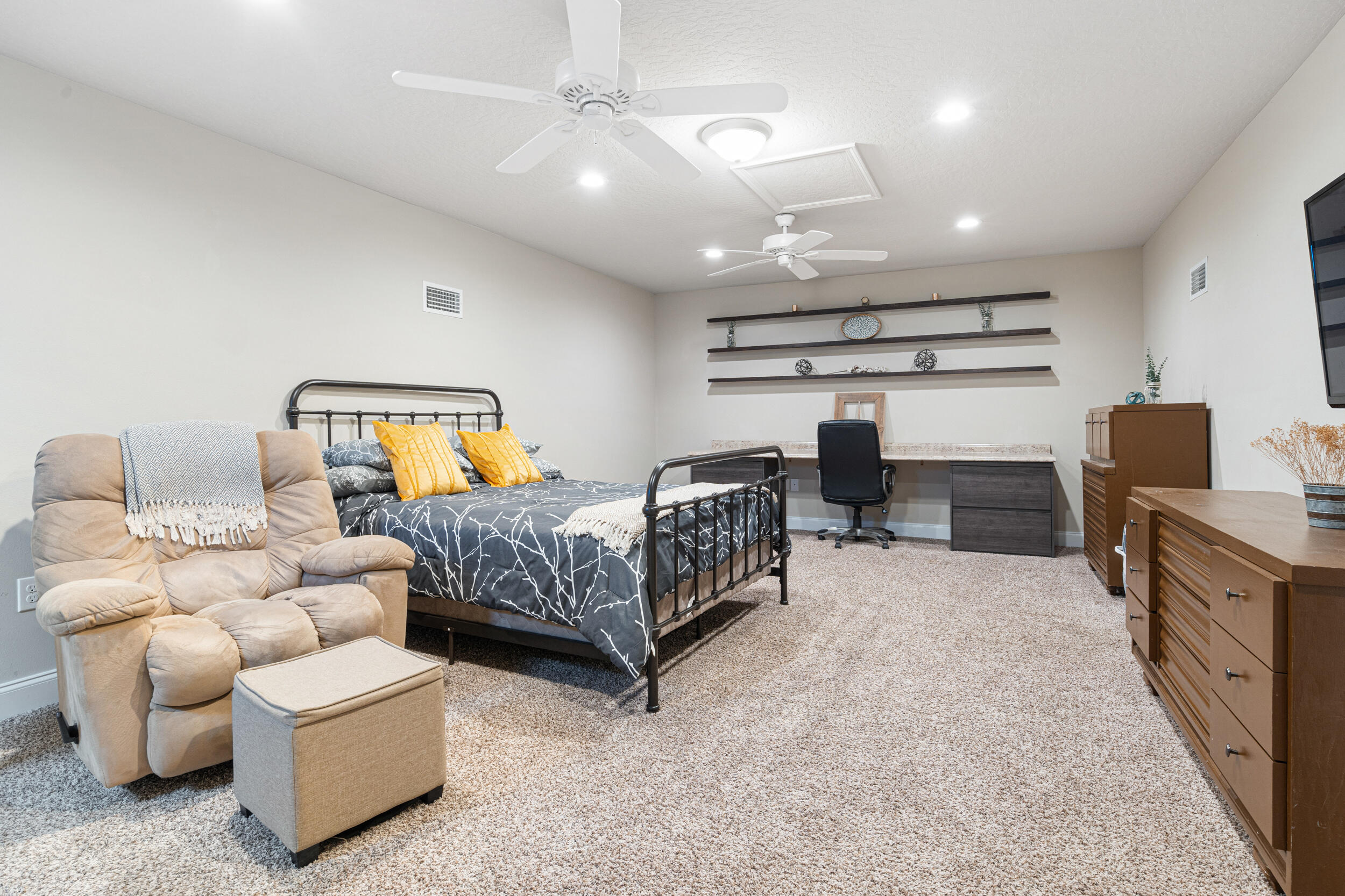 4646 Chanan Drive Crestview, FL 32539 - Photo 33 of 56 a bedroom with furniture and a couch