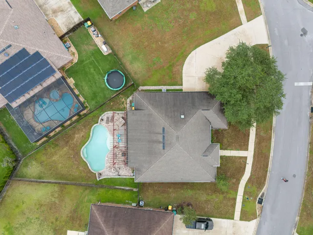 a view of a house with a swimming pool