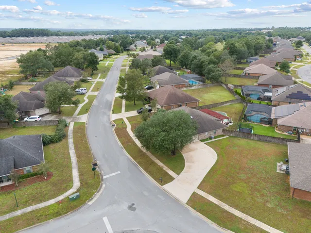 a view of house with yard