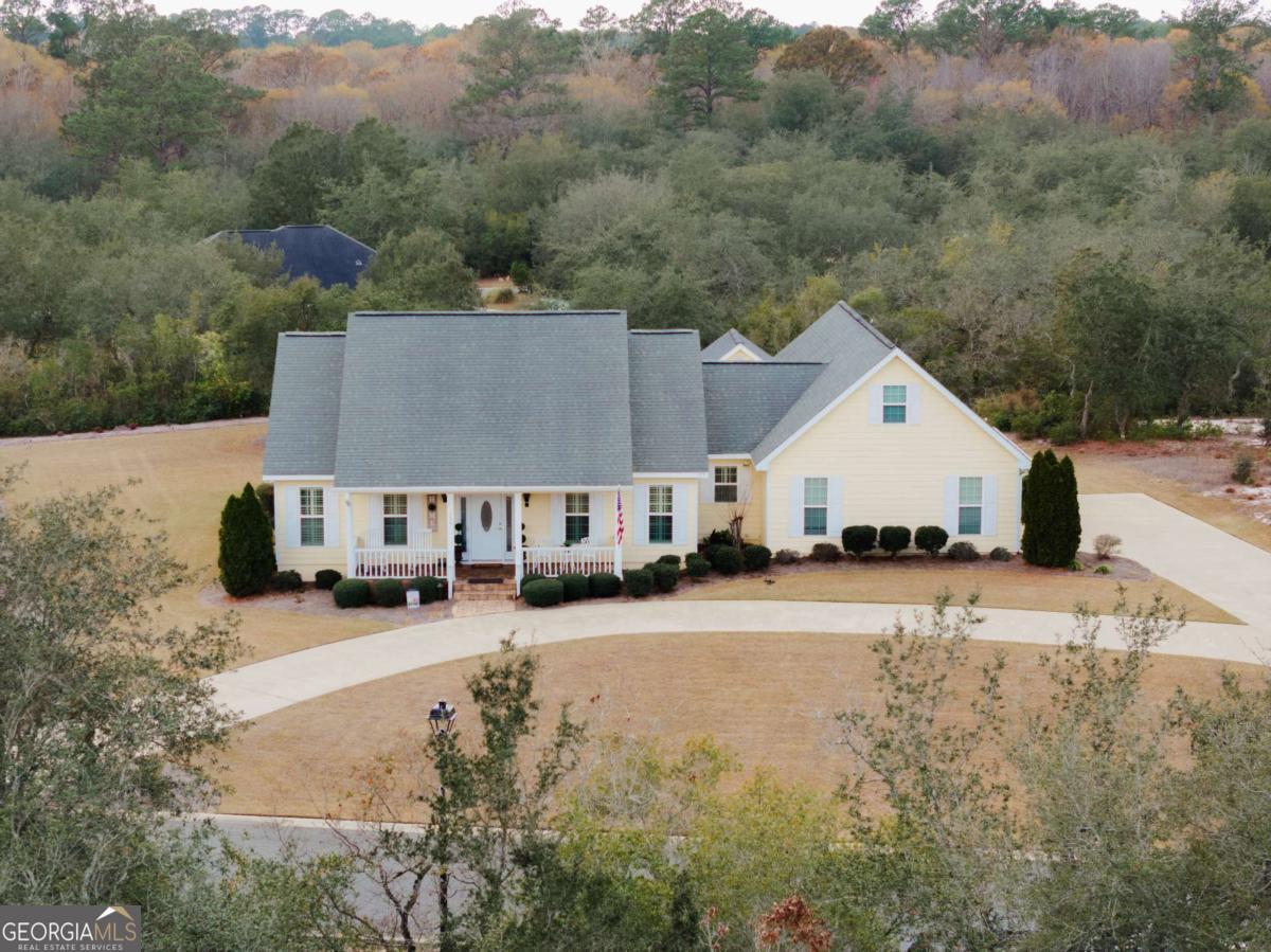 105 Plantation Pnes Drive Blackshear, GA 31516 - Photo 1 of 48 a view of a house with a yard