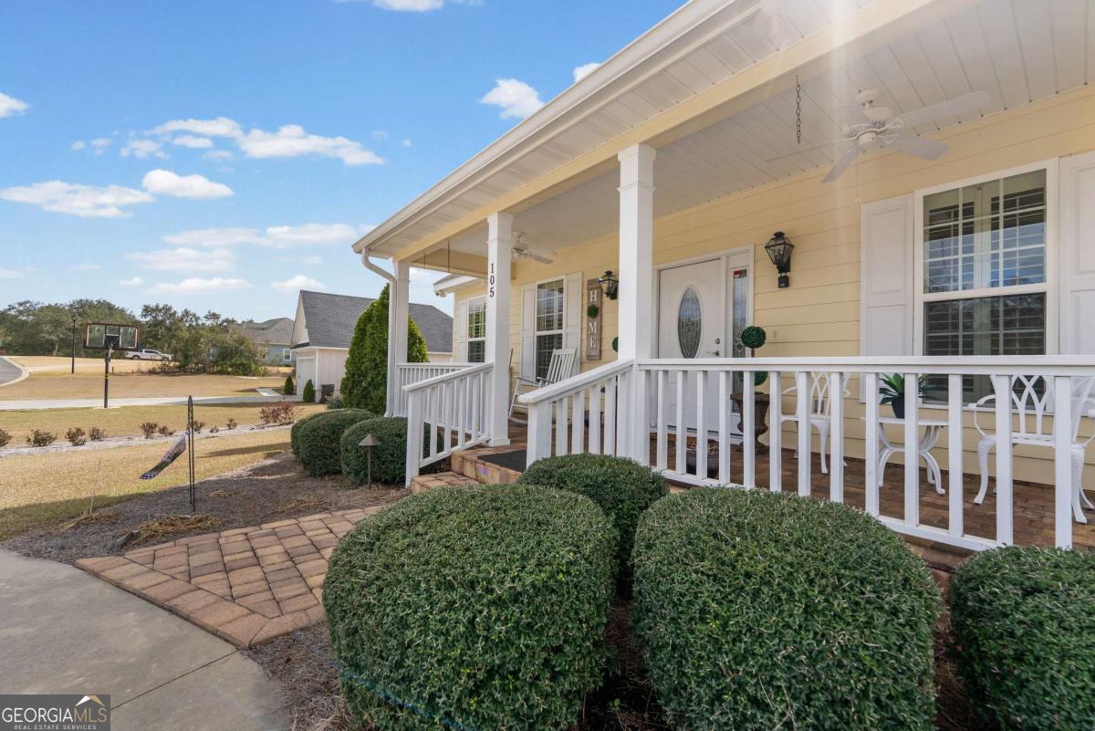105 Plantation Pnes Drive Blackshear, GA 31516 - Photo 14 of 48 a view of a house with backyard and sitting area