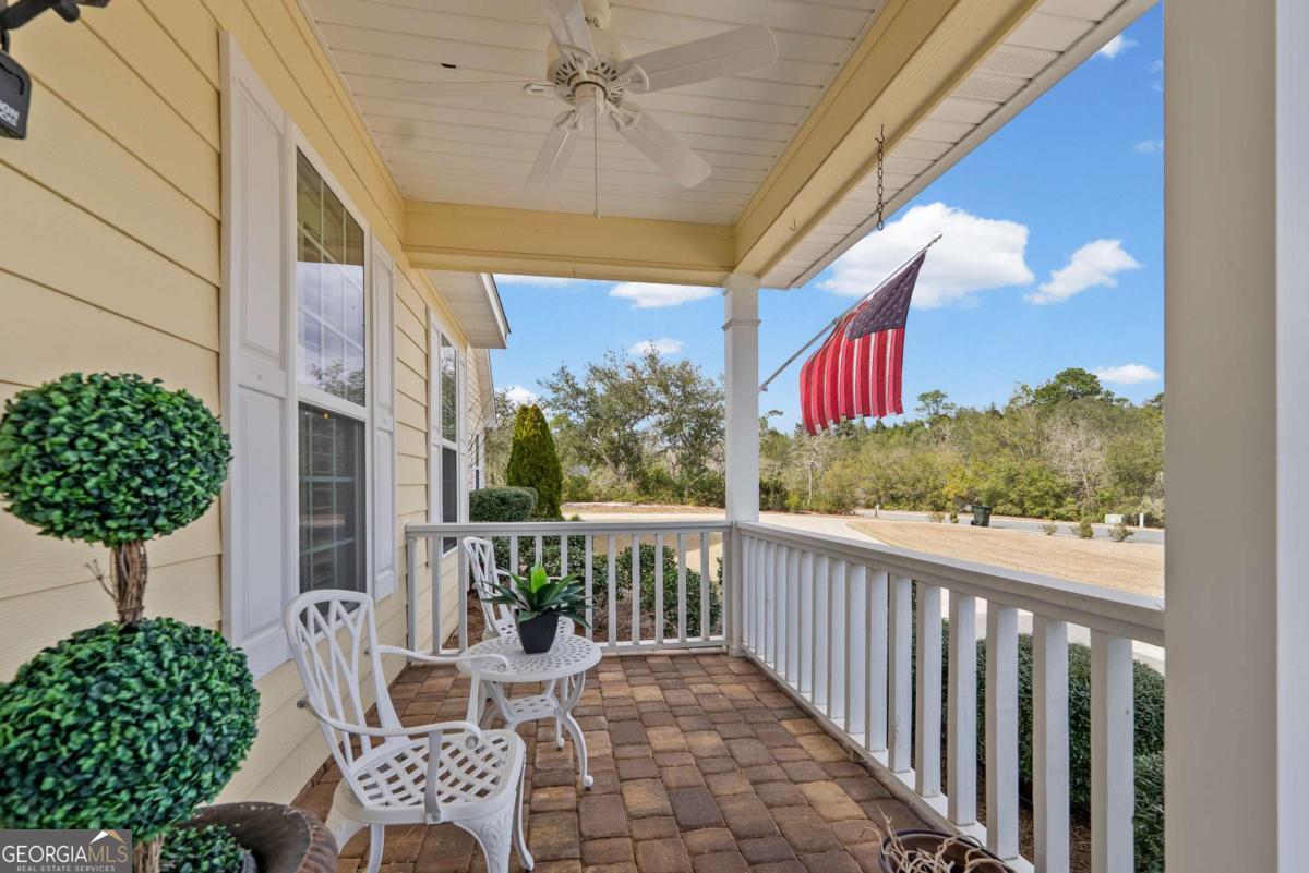 105 Plantation Pnes Drive Blackshear, GA 31516 - Photo 15 of 48 a view of a balcony with chairs