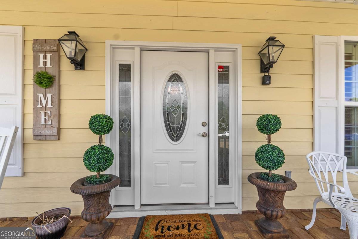 105 Plantation Pnes Drive Blackshear, GA 31516 - Photo 17 of 48 a front view of a house