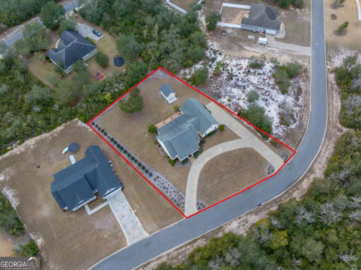 105 Plantation Pnes Drive Blackshear, GA 31516 - Photo 3 of 48 an aerial view of residential house with outdoor space