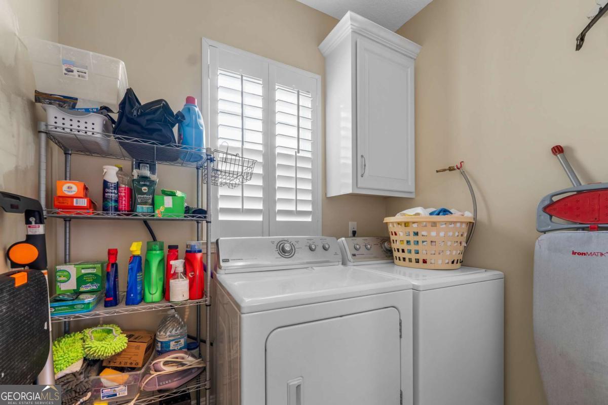 105 Plantation Pnes Drive Blackshear, GA 31516 - Photo 33 of 48 a utility room with dryer and washer