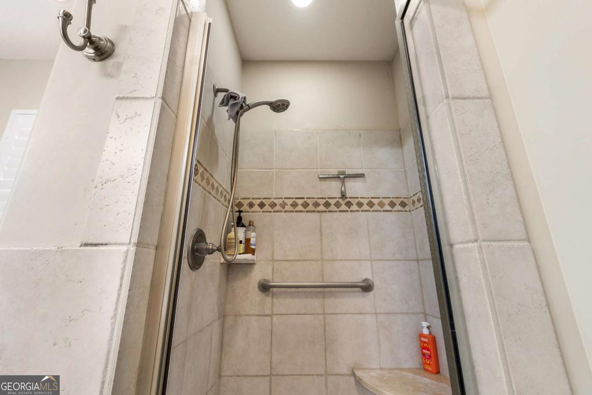 105 Plantation Pnes Drive Blackshear, GA 31516 - Photo 39 of 48 a bathroom with a shower