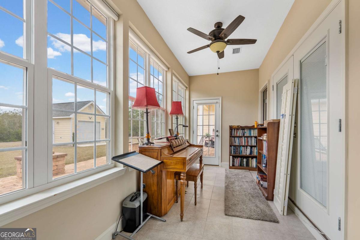 105 Plantation Pnes Drive Blackshear, GA 31516 - Photo 42 of 48 a view of a livingroom with furniture and window