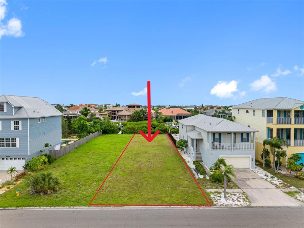 6415 Marbella Boulevard Apollo Beach, FL 33572 - Photo 2 of 14 a view of a house with a yard