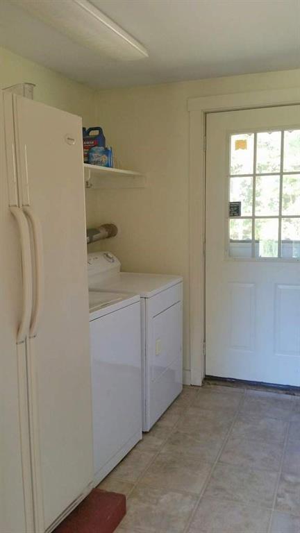 1100 Middle Road New Portland, ME 04961 - Photo 11 of 39 First floor laundry is conveniently...