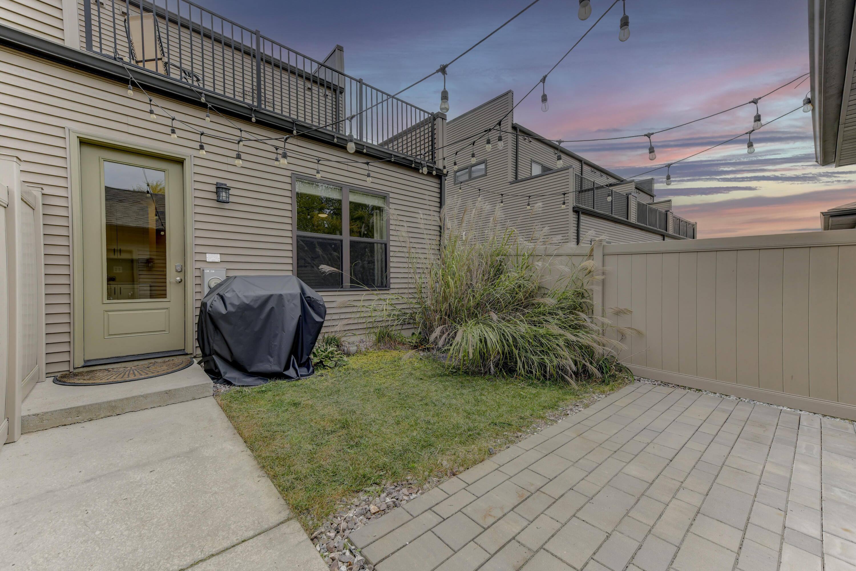 360 North Indiana Avenue Crown Point, IN 46307 - Photo 19 of 22 a view of a house with backyard and sitting area