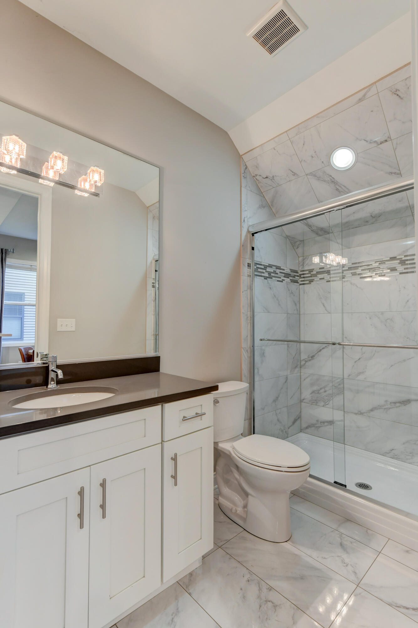 360 North Indiana Avenue Crown Point, IN 46307 - Photo 9 of 22 a bathroom with a sink a toilet and shower