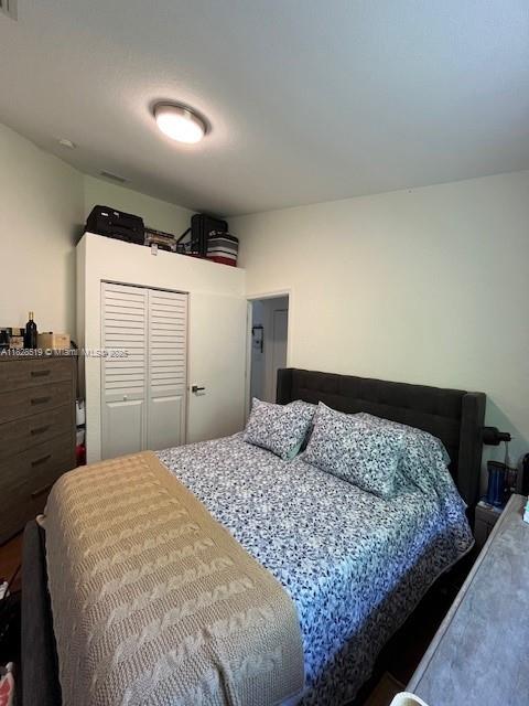 1988 Southeast 12th Street Homestead, FL 33035 - Photo 17 of 44 a bedroom with a bed and dresser