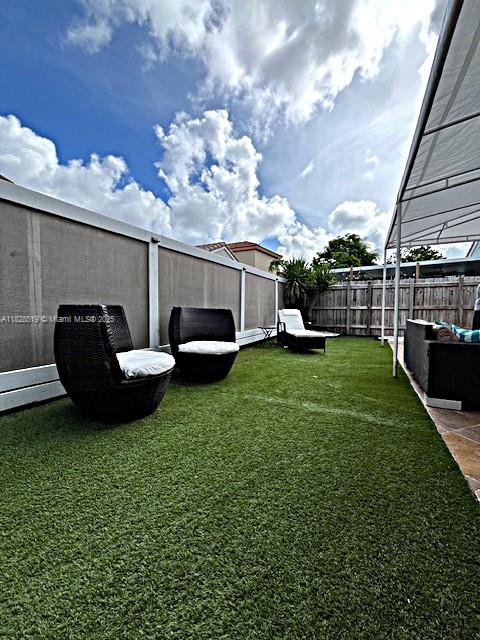 1988 Southeast 12th Street Homestead, FL 33035 - Photo 34 of 44 a view of a backyard with sitting area