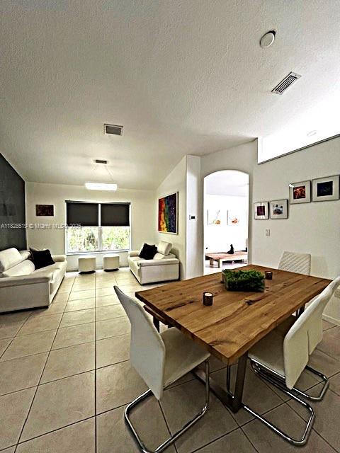 1988 Southeast 12th Street Homestead, FL 33035 - Photo 6 of 44 a living room with furniture and flat screen tv