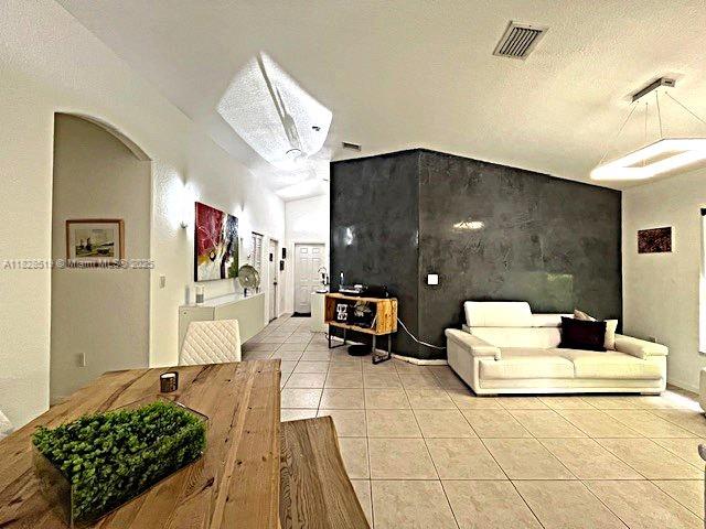 1988 Southeast 12th Street Homestead, FL 33035 - Photo 8 of 44 a living room with furniture and a table