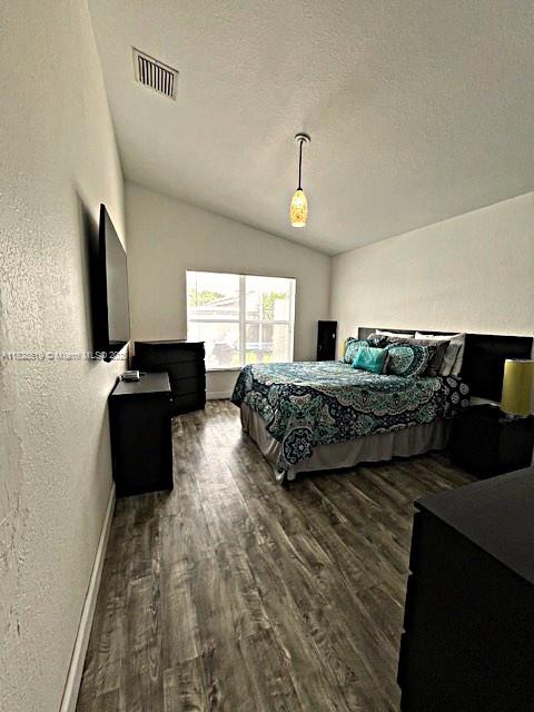 1988 Southeast 12th Street Homestead, FL 33035 - Photo 10 of 44 a living room with furniture and a flat screen tv